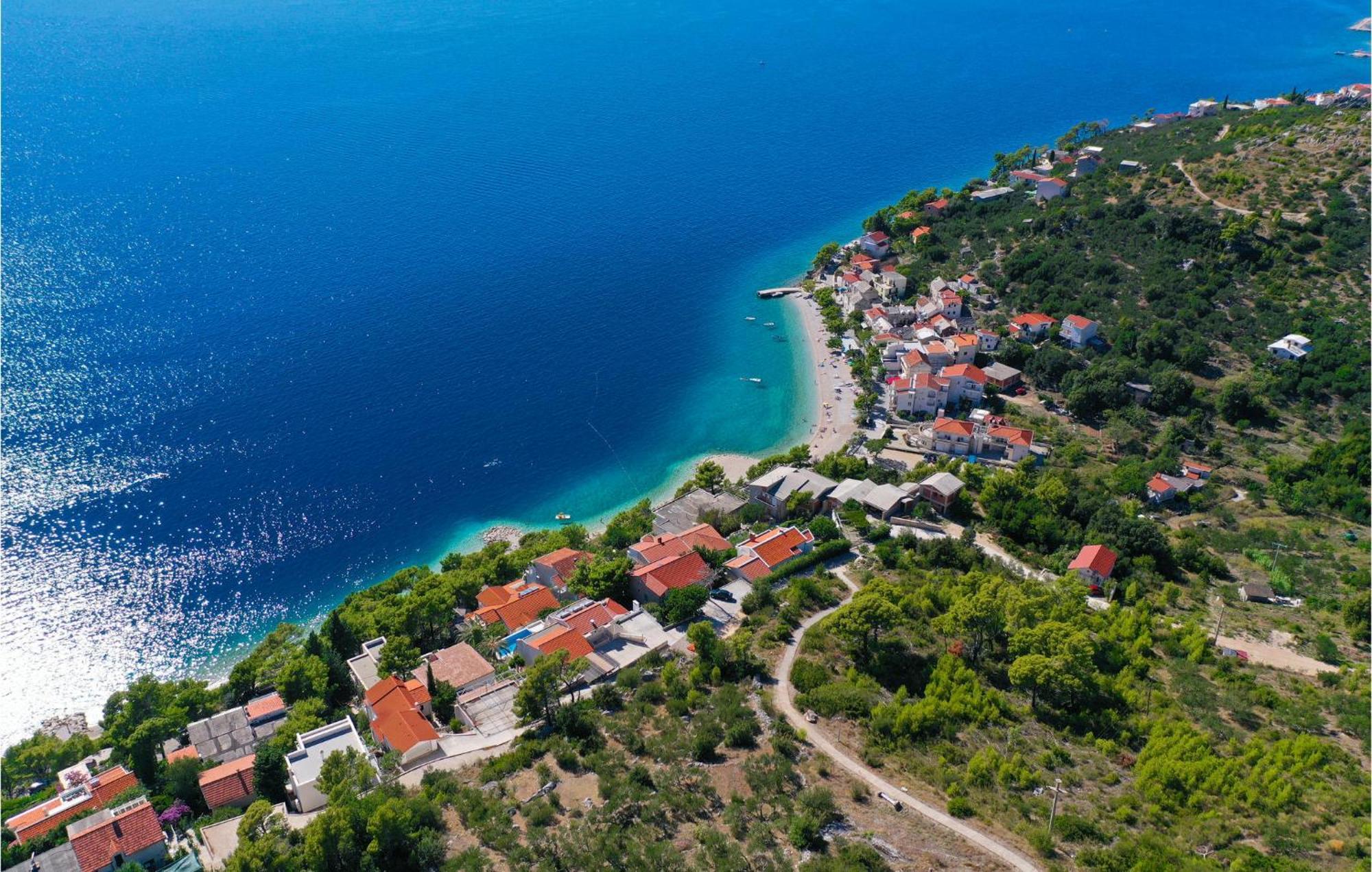 Nice Apartment In Krvavica With House Sea View Eksteriør bilde
